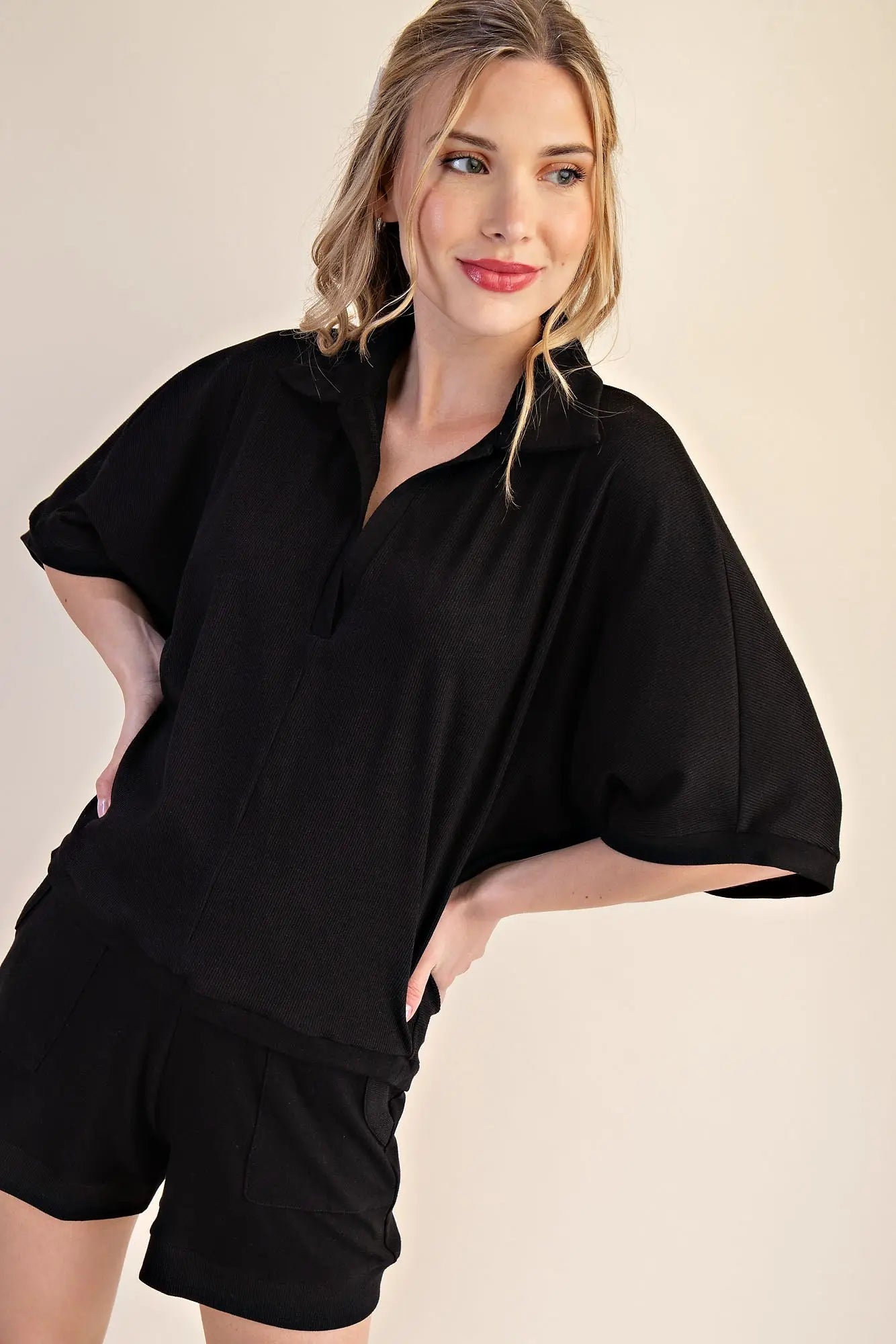 V-NECKLINE DROPPED SHOULDER KNIT TOP