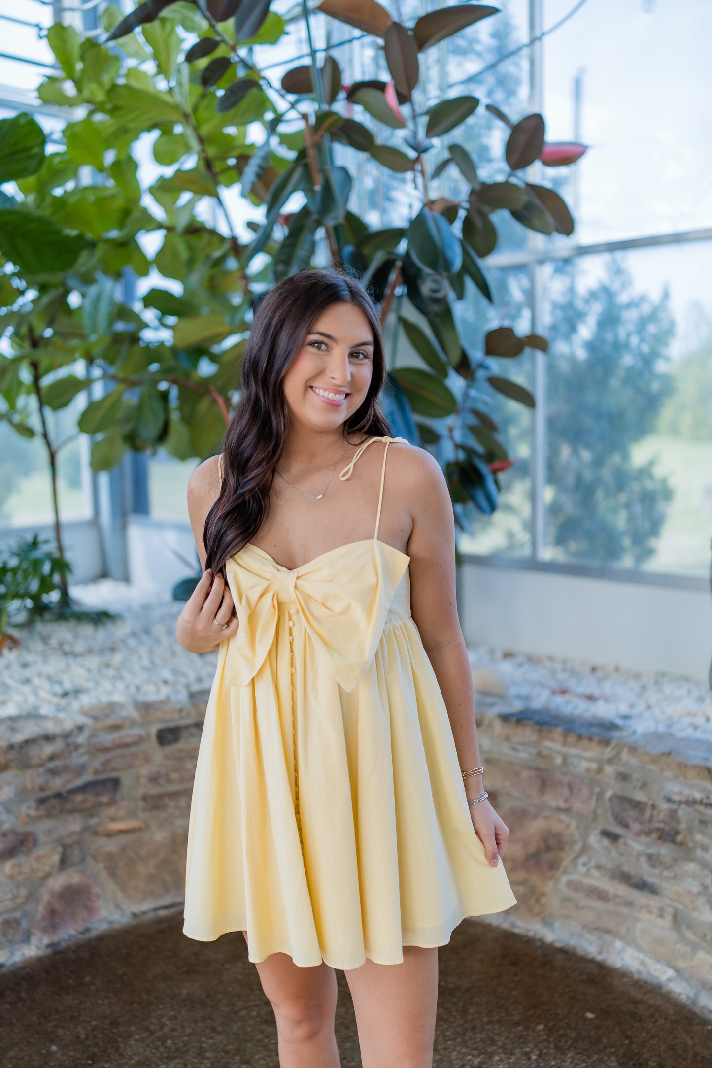 BOW STATEMENT BABY DOLL DRESS