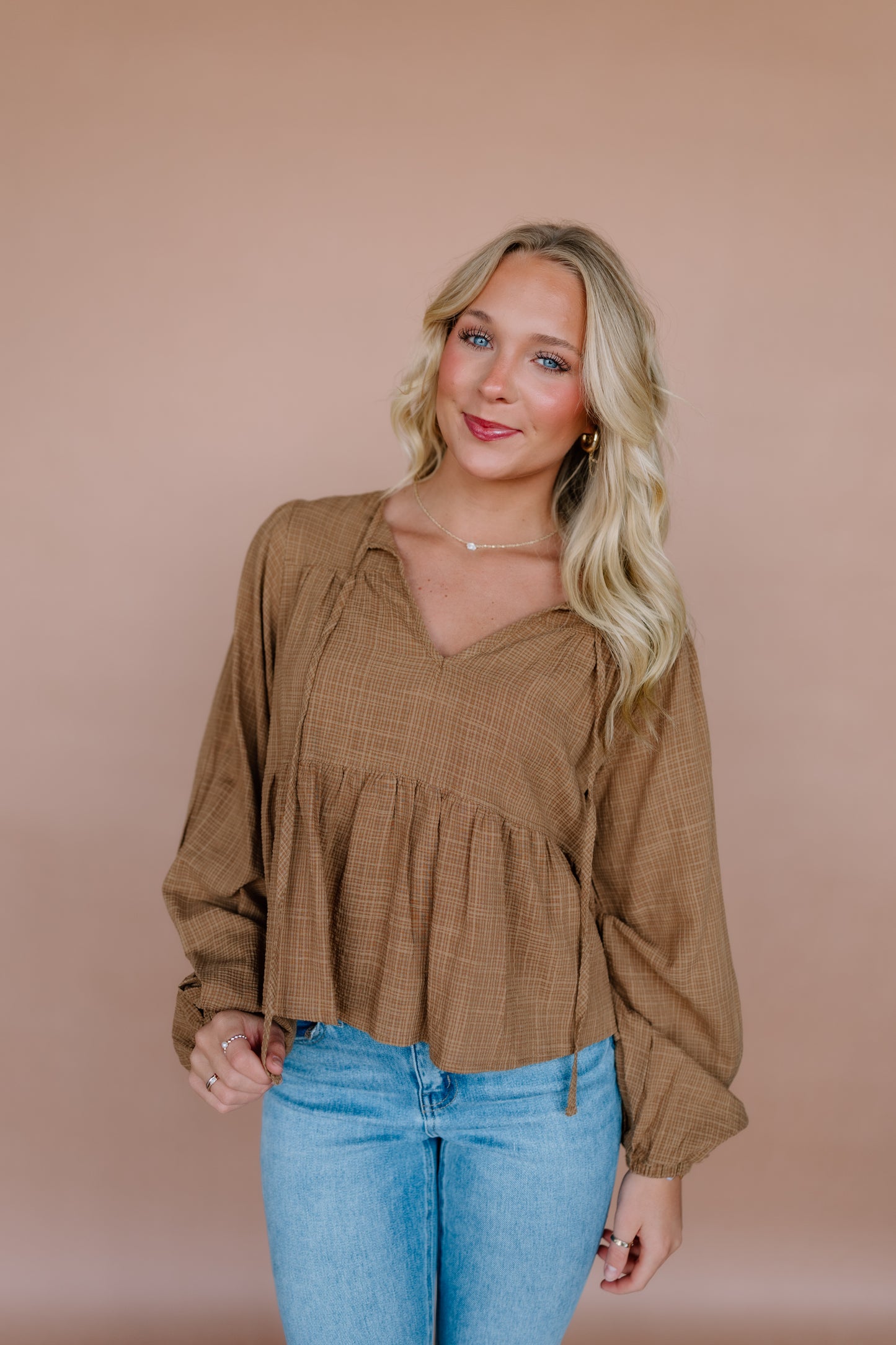 TEXTURED BLOUSE WITH TIE DETAILING