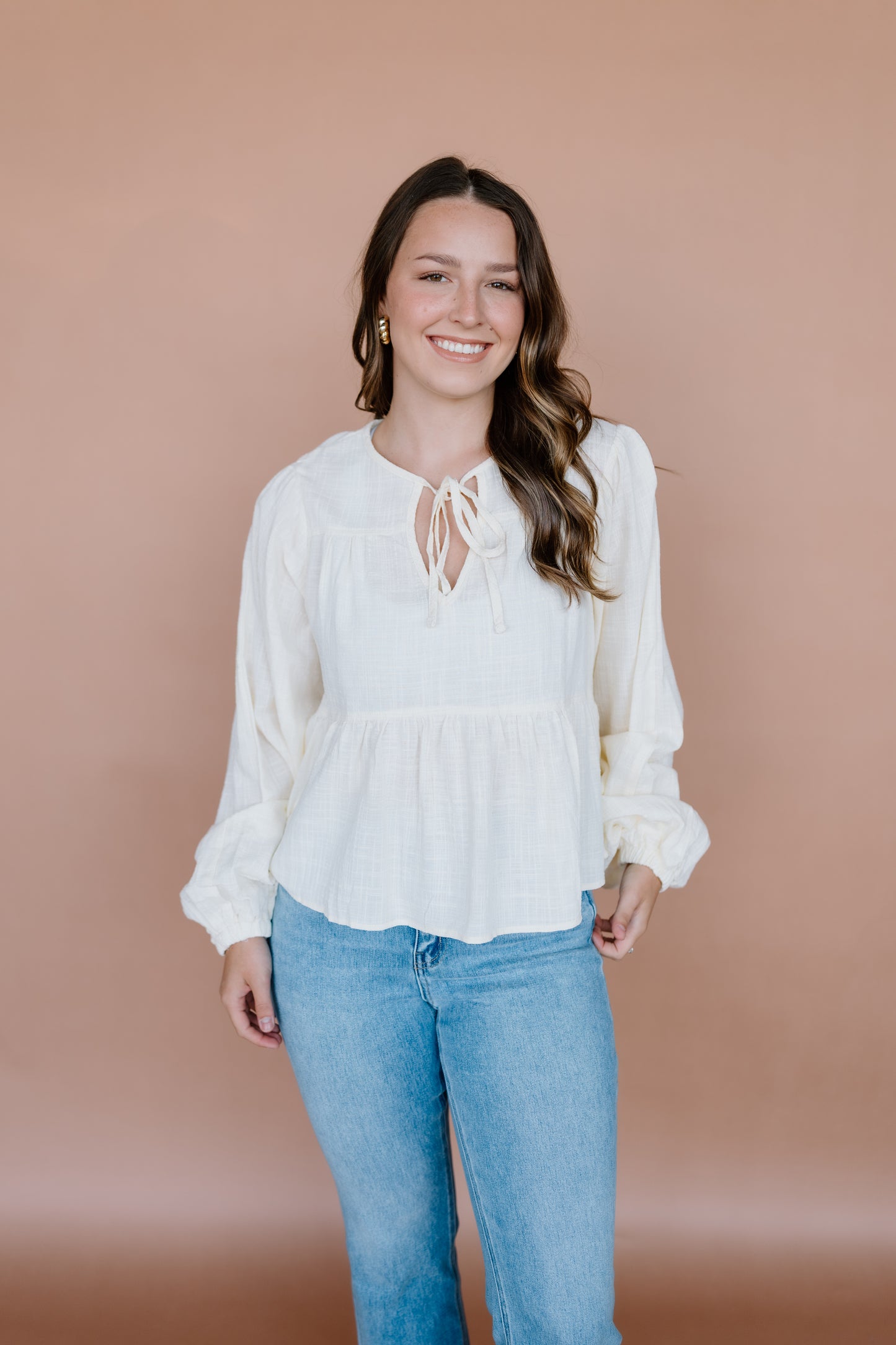 TEXTURED BLOUSE WITH TIE DETAILING
