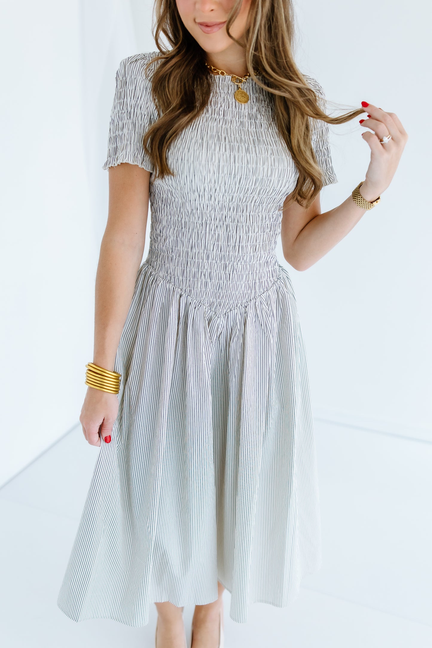 MEET ME THERE STRIPE SMOCKED DRESS