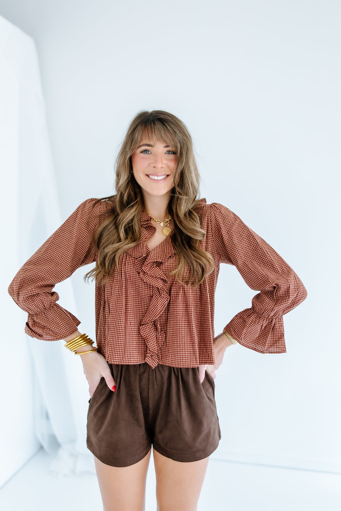 ON THE UPS RUFFLE TOP