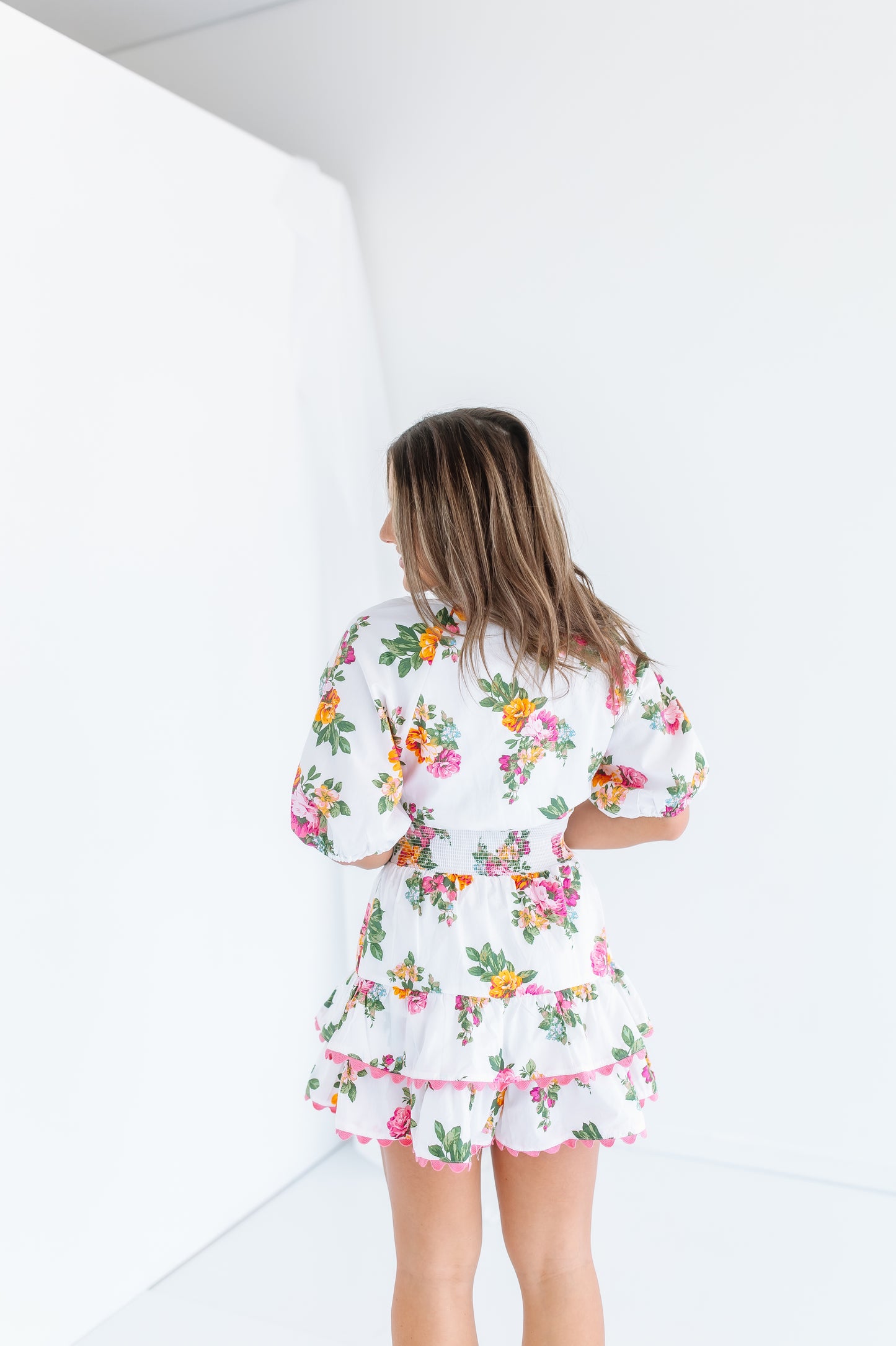 DEJA FLORAL SMOCKED MINI DRESS