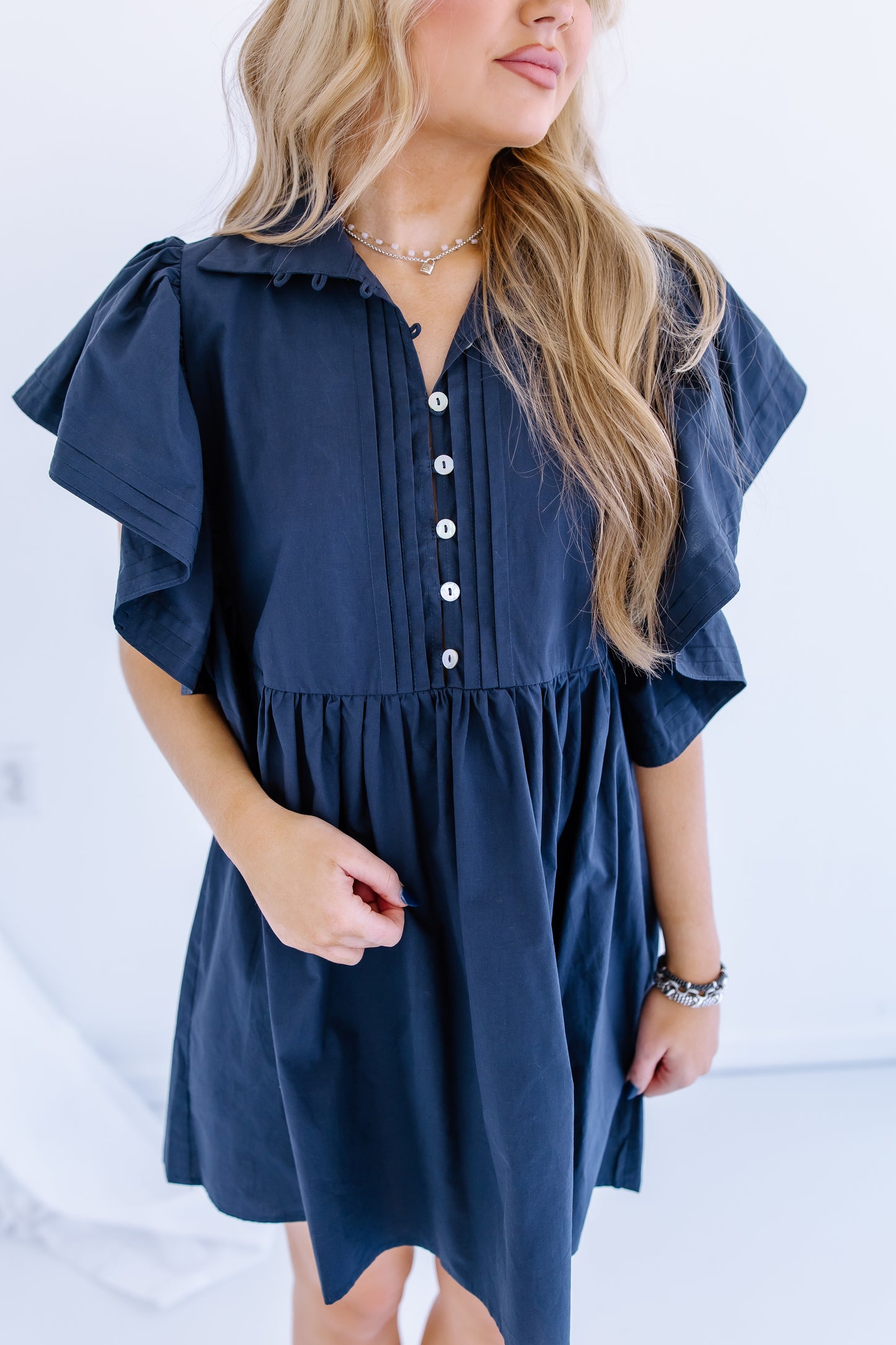 NAVY RUFFLE BASIC MINI DRESS