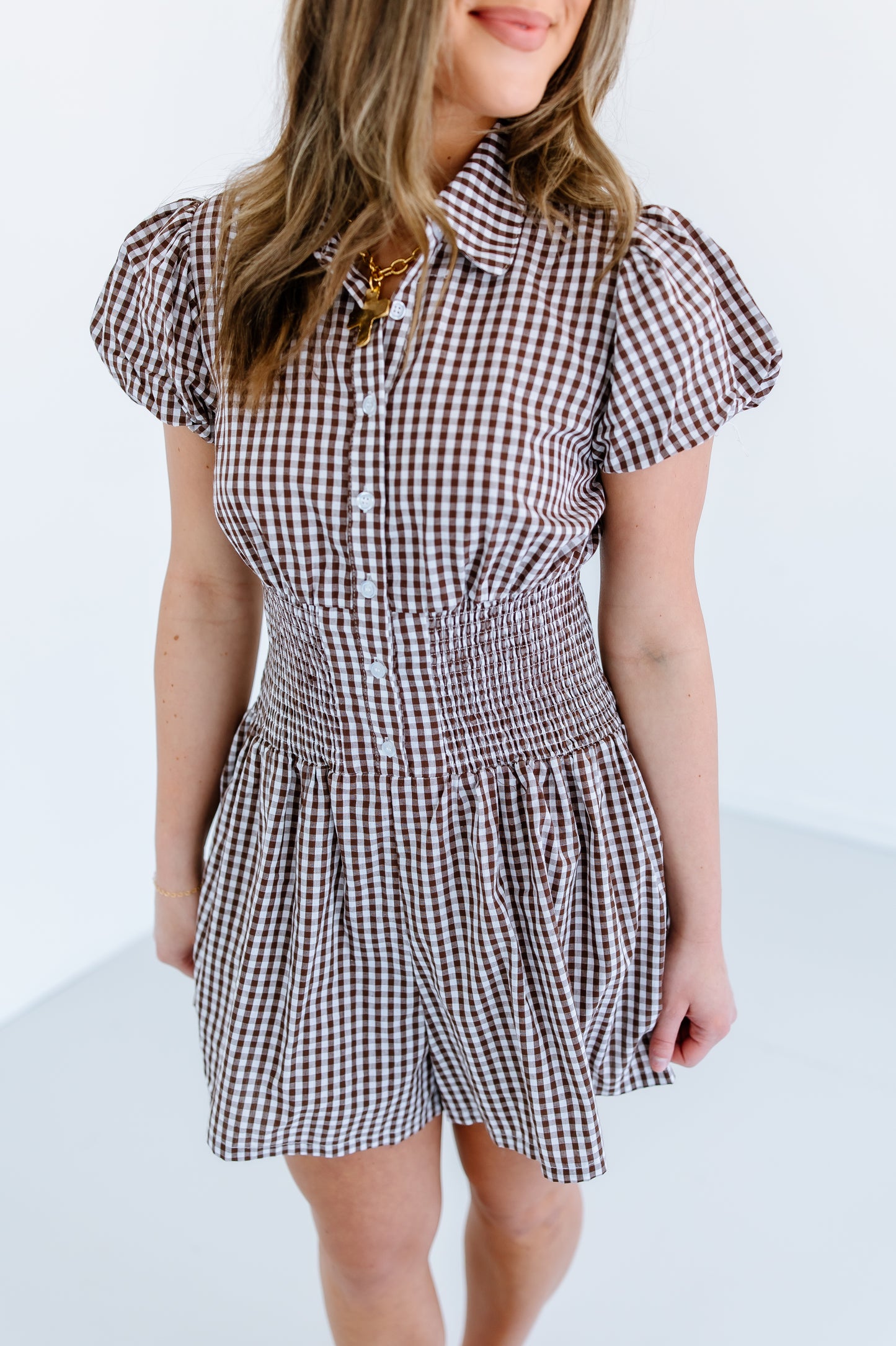 BROWN GINGHAM SMOCKED ROMPER