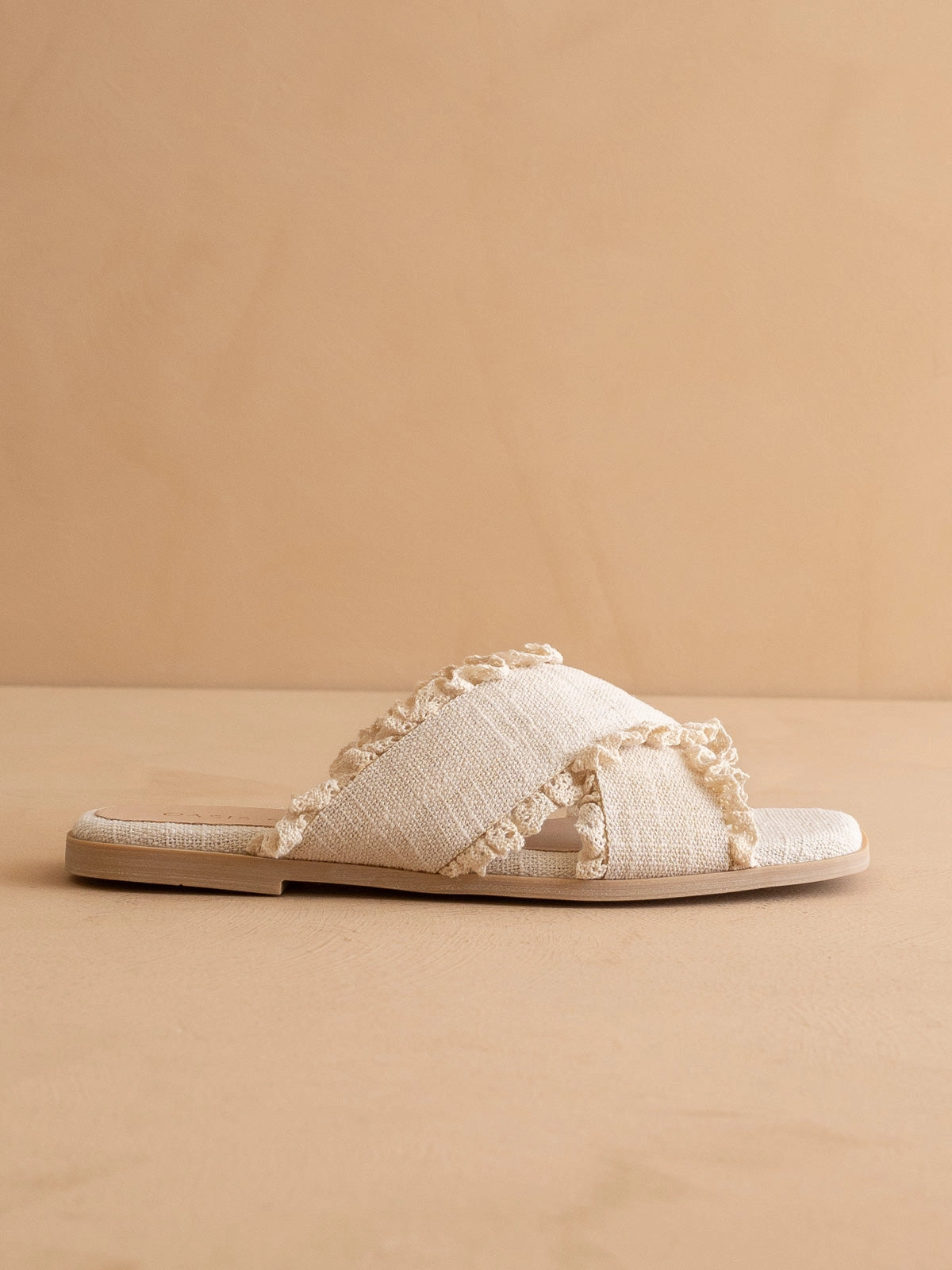 THE ALLIE CREAM LACE TRIM CROSS SLIDE