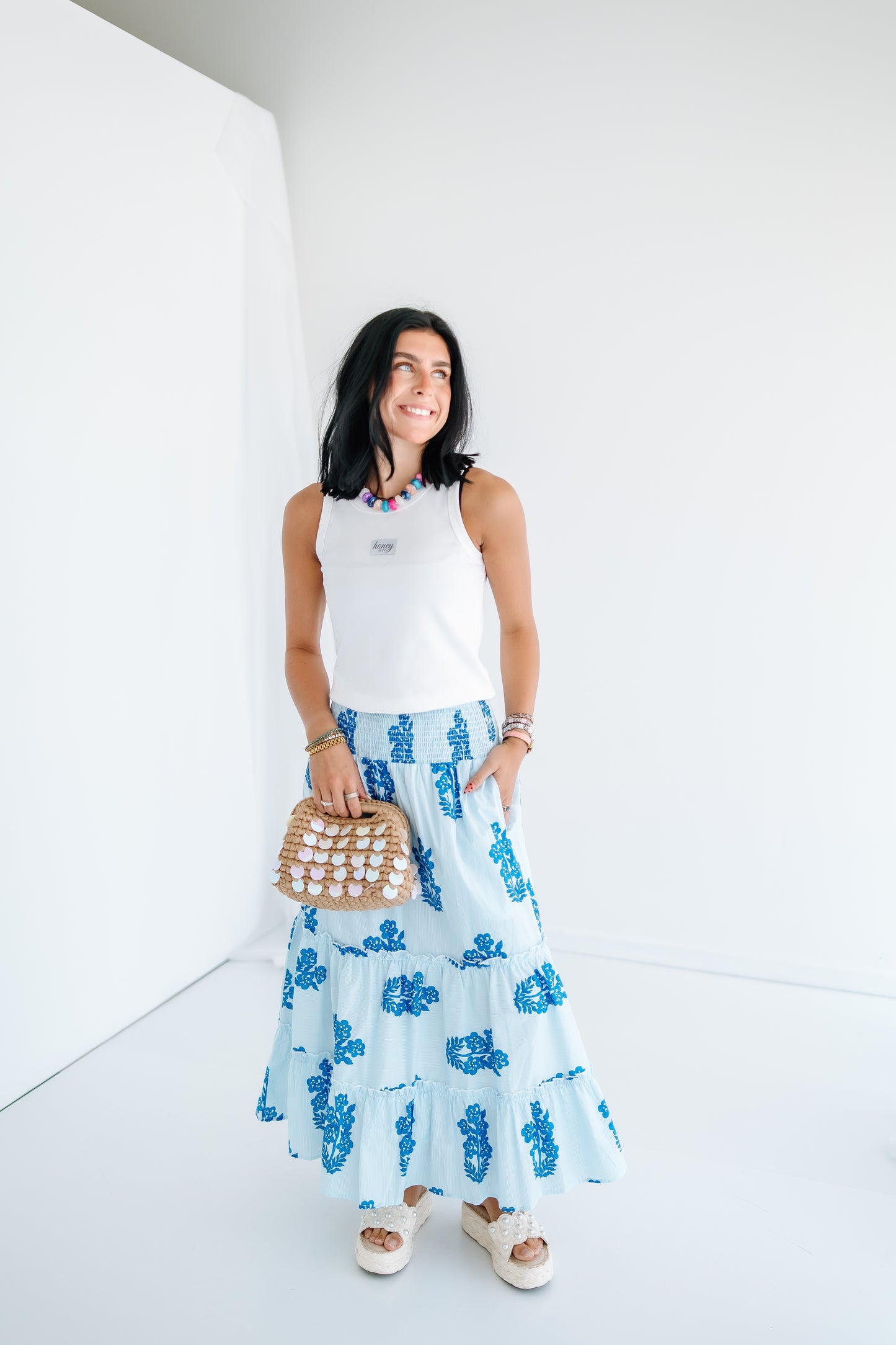ALL YOU NEED SMOCKED FLORAL SKIRT