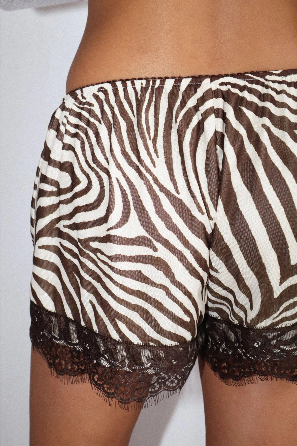 ZEBRA PRINT LACE MINI SHORTS