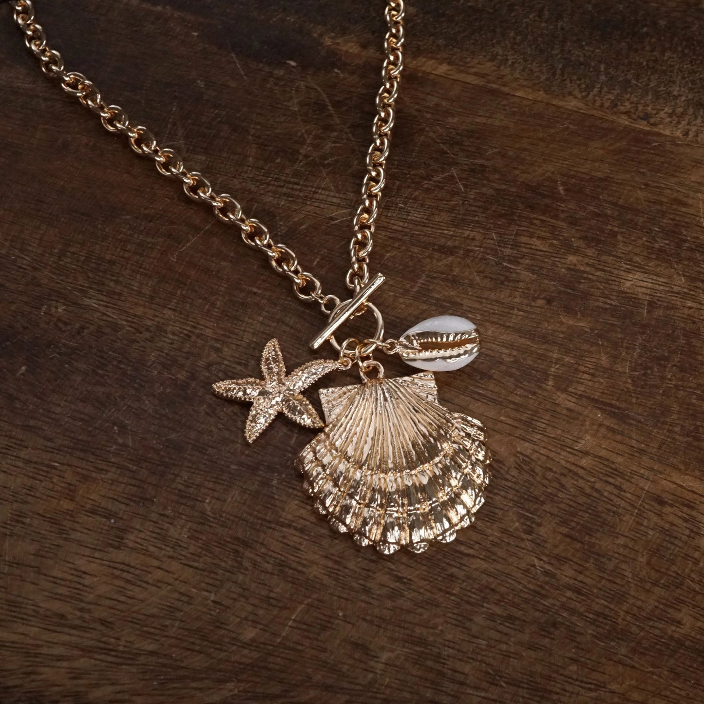 Front Toggle Multi-Charm Shell Statement Necklace