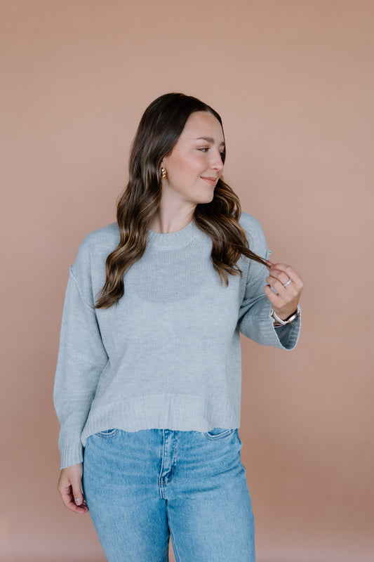 ROUND NECK PLEATED SWEATER