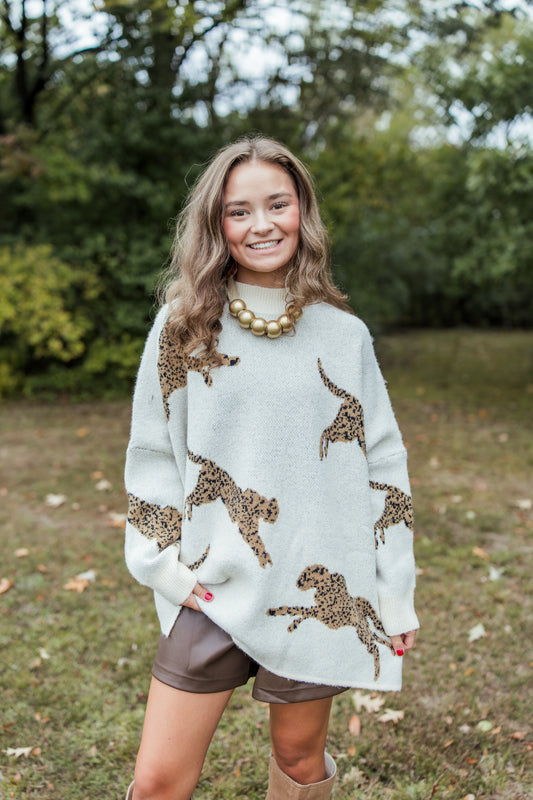 CHEETAH PRINT MOCK NECK SWEATER