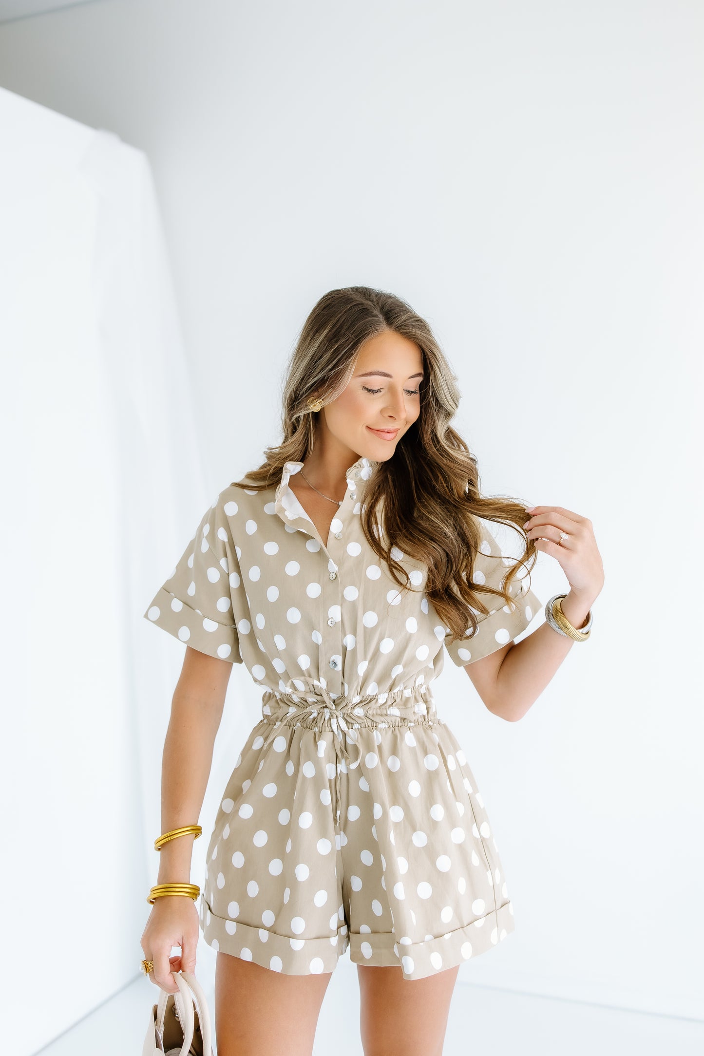 ON A JET POLKA DOT ROMPER