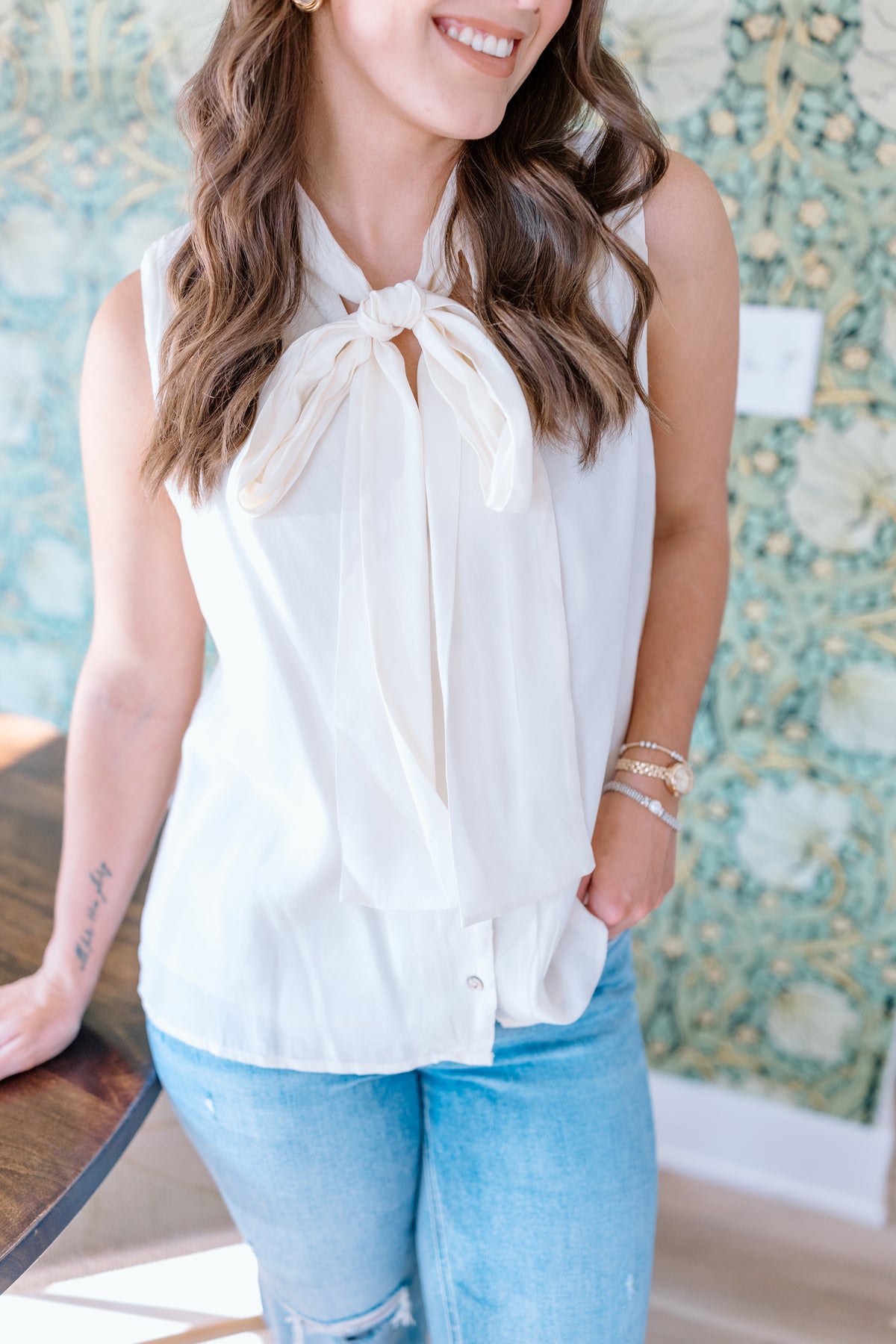 A LITTLE TIE NECK TOP