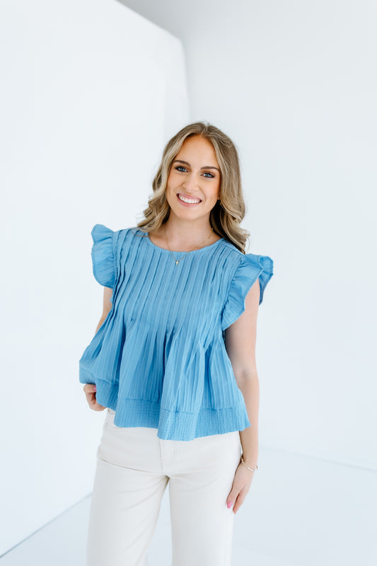 ITS THE TOP RUFFLE TOP