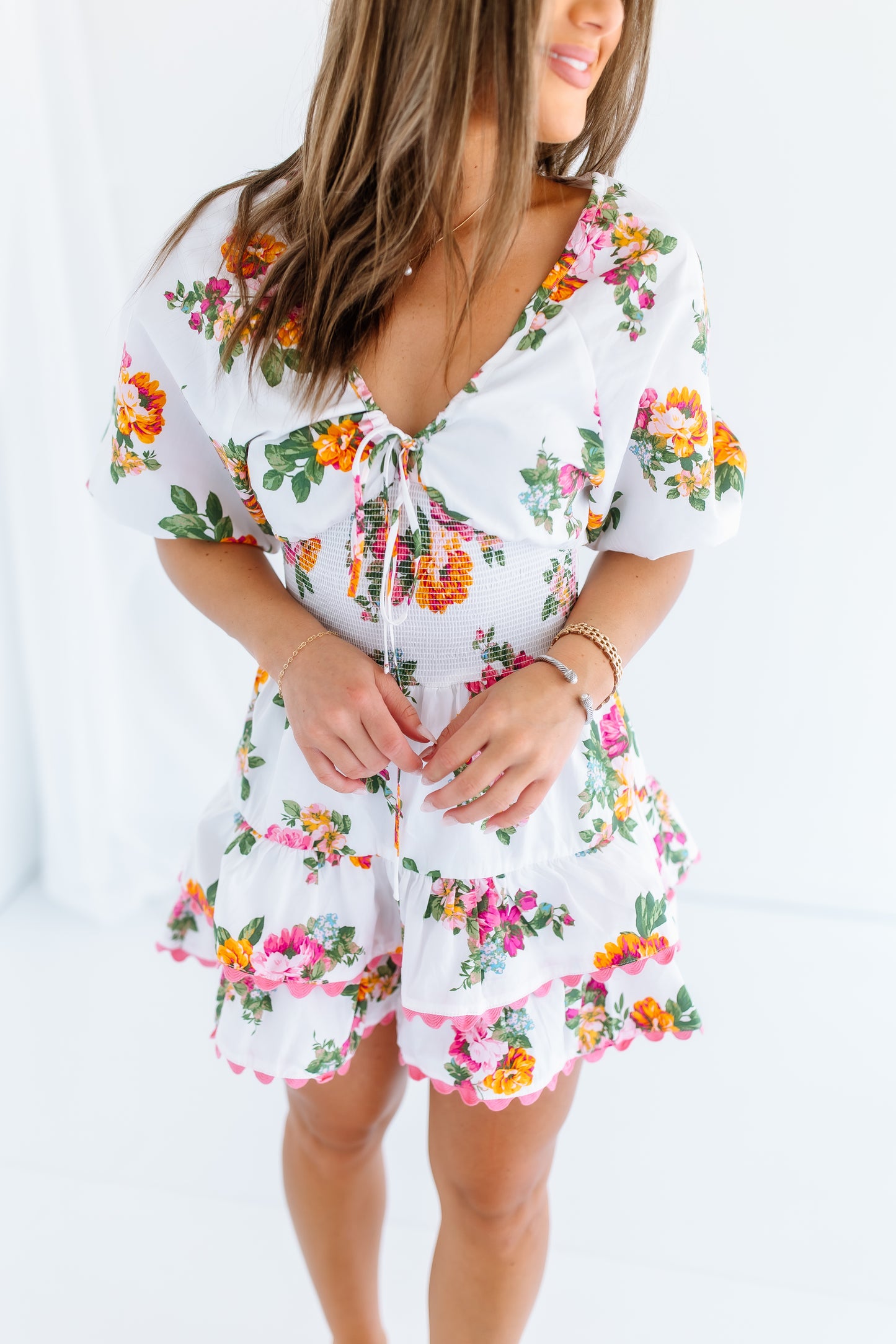 DEJA FLORAL SMOCKED MINI DRESS