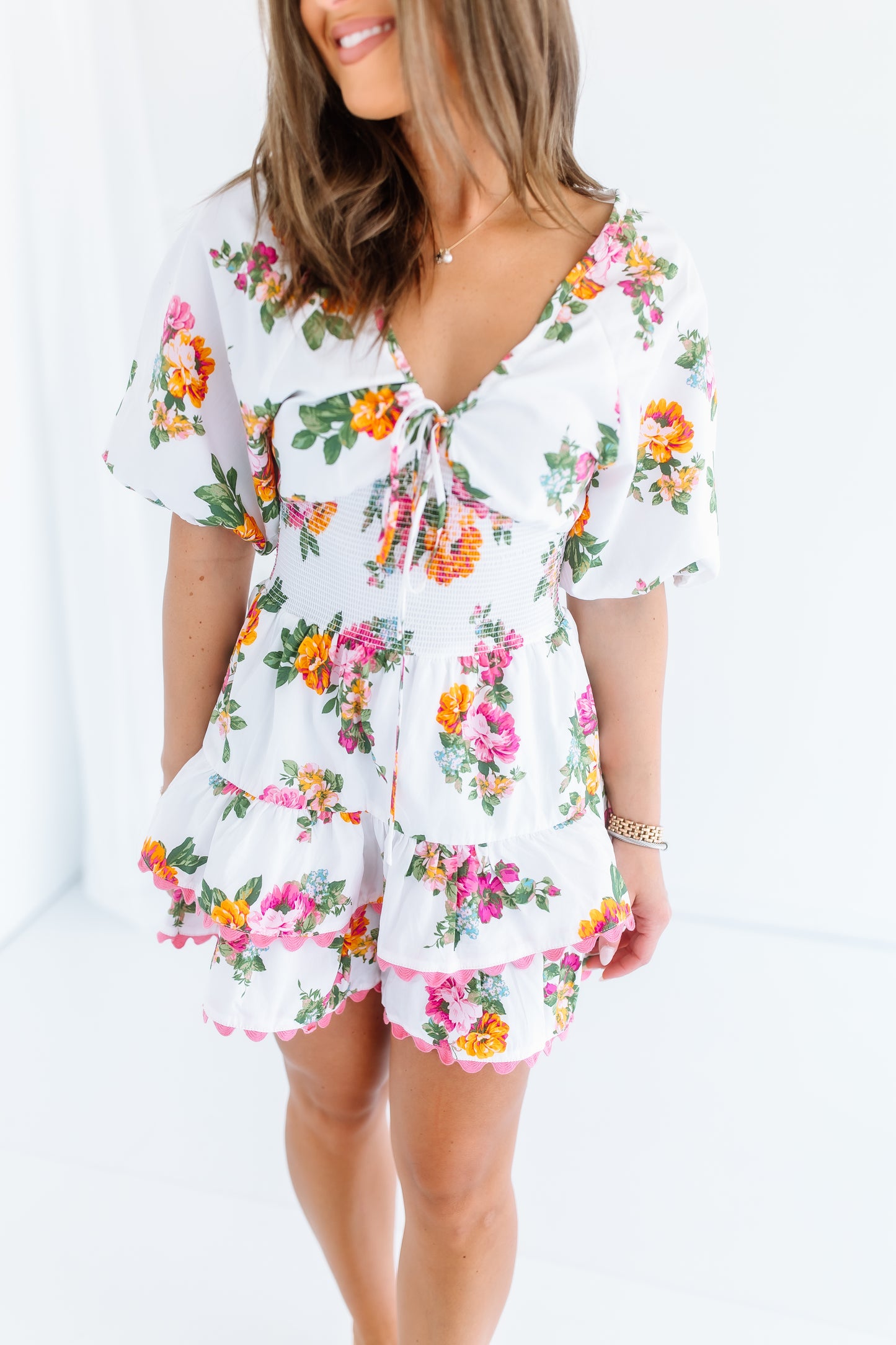 DEJA FLORAL SMOCKED MINI DRESS