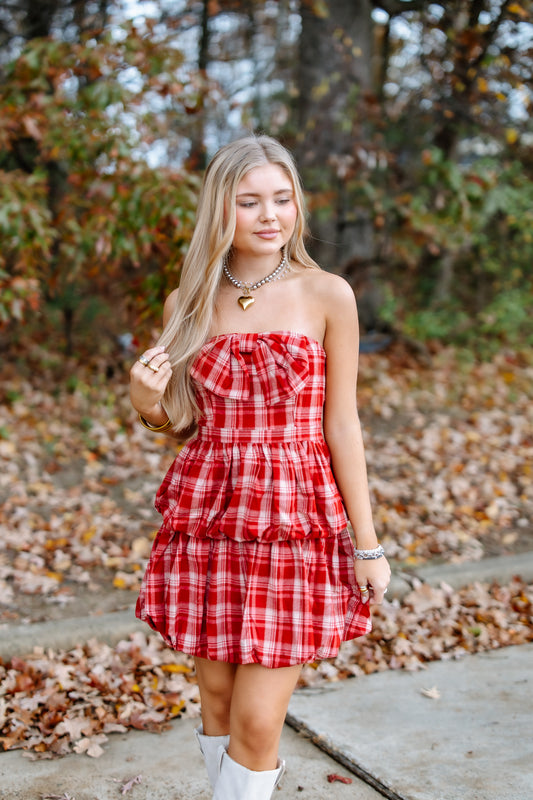 MAKING A STATEMENT BOW MINI DRESS