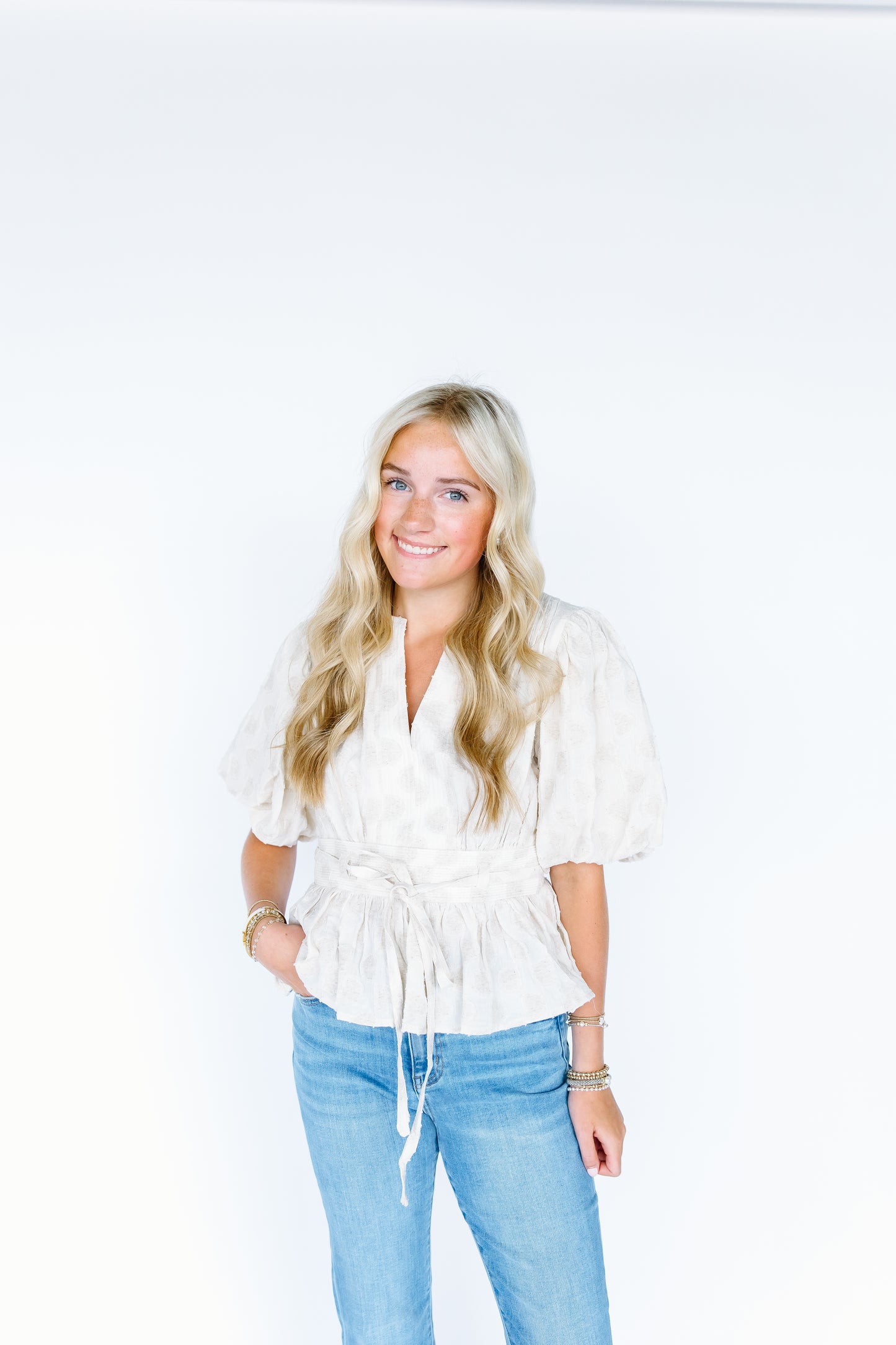 DOTTED PEPLUM TOP