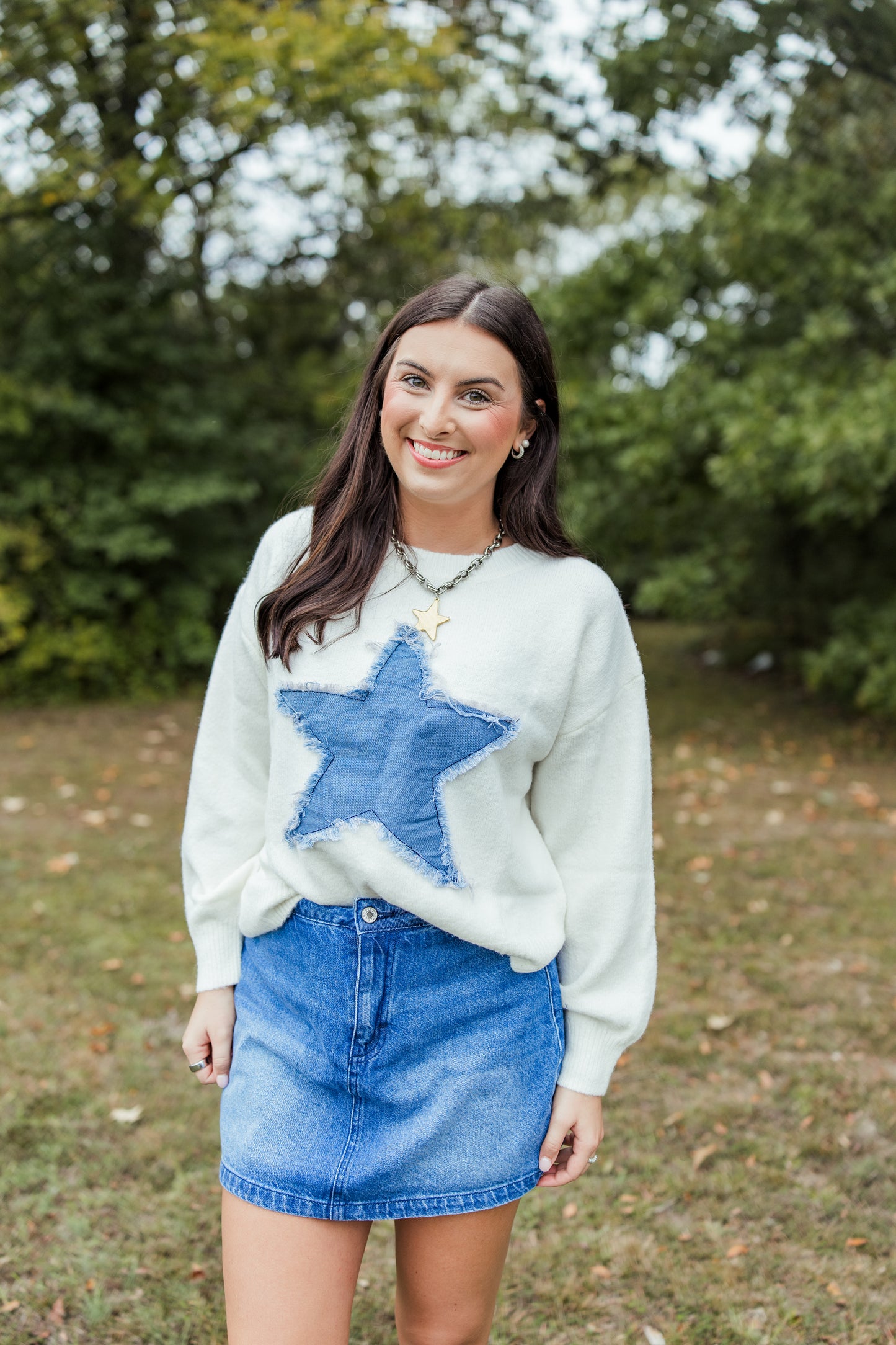 DISTRESSED DENIM STAR SWEATER