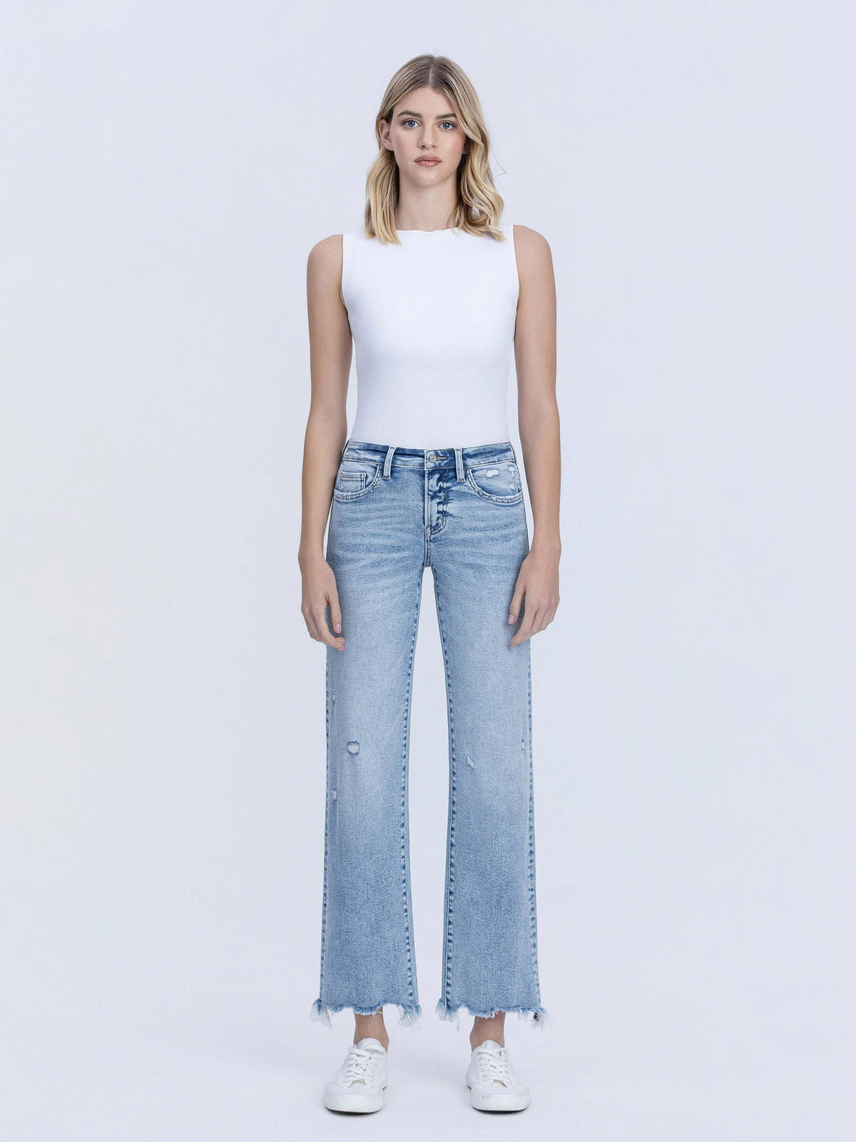 MID RISE UNEVEN RAW HEM SLIM WIDE JEANS