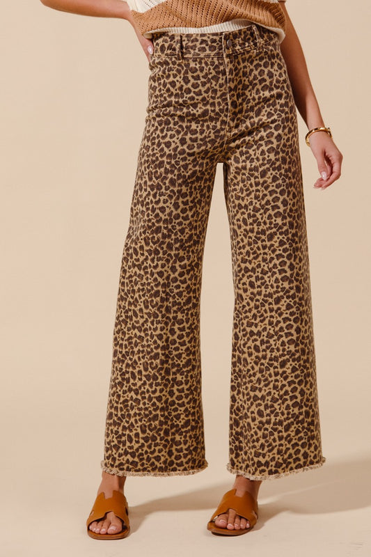 MID RISE LEOPARD FRAYED LEG PANTS